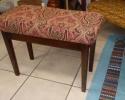 This bench was reupholstered with a few minor fixes to the seat and legs.

