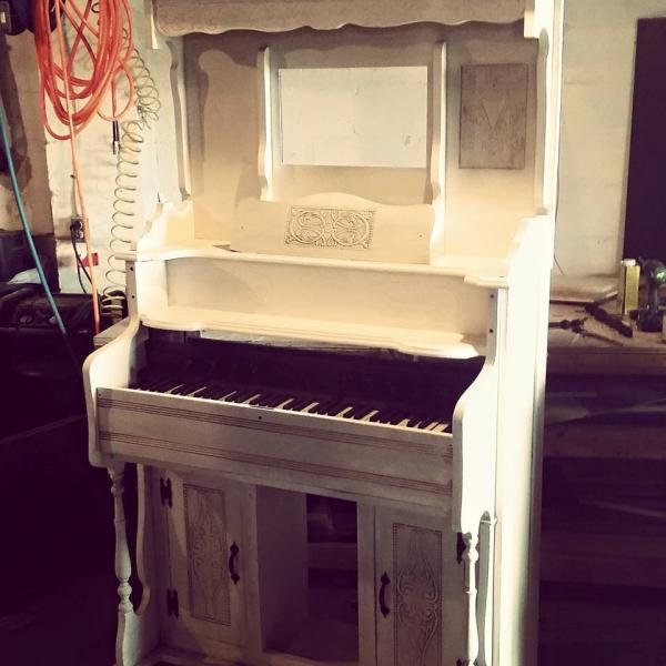 We worked hard on this beauty and we didn't want to take away from its grandness. Now it will live its life as a grand white piano!