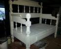 The finished product is a distressed white bench with a beautiful back and arms.