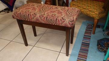 This bench was reupholstered with a few minor fixes to the seat and legs.

